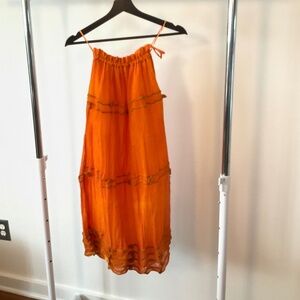 Orange resort season halter mini.
